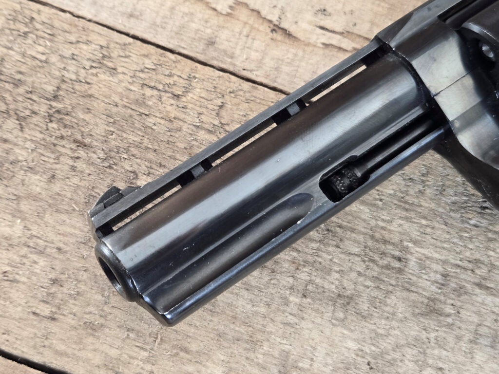 Recessed chambers and grooved top strap on Zastava M83