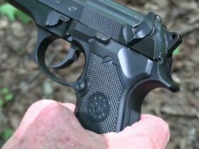 Beretta 92 FS Suppressed Close-up